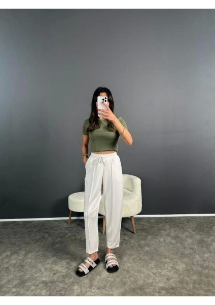 Kadın Beyaz Renk Beli Lastikli Modal Kumaş Çımalı Bilek Pantolon Yumuşak Dokulu Şık Bağcıklı Pantolon modelleri