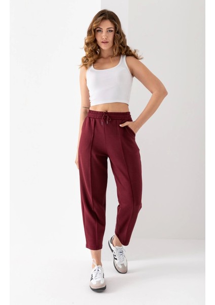 Kadın Bordo Renk Beli Lastikli Modal Kumaş Çımalı Bilek Pantolon Yumuşak Dokulu Şık Bağcıklı Pantolon modelleri