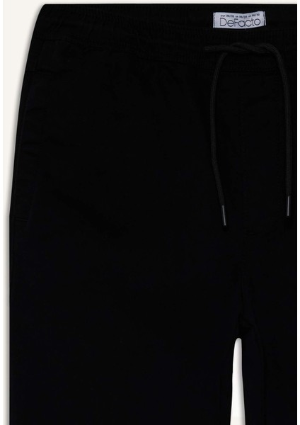 Jogger Fit Beli Bağcıklı Üç Cepli Pantolon F4680AX25AU fiyatları