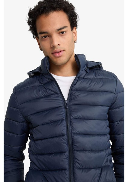 Su İtici Slim Fit Dar Kesim İç Cep Detaylı Kapüşonlu Fermuarlı Cepli Şişme Mont N4661AZ25AU fırsatları