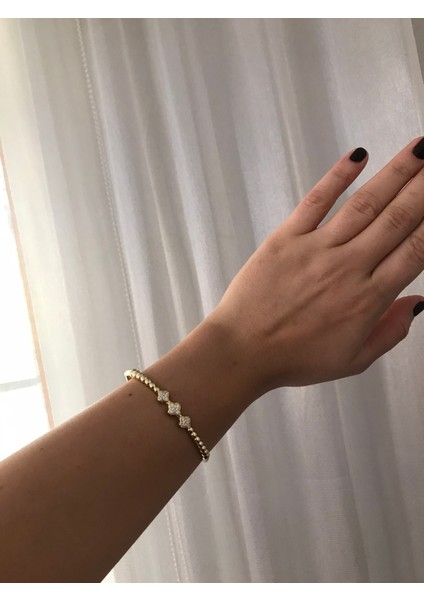 Taşlı Bombeli Gold Kadın Kelepçe – Zarif, Şık ve Işıltılı Takı Modeli fırsatları