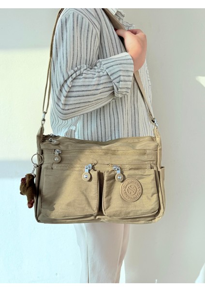 Kadın Orta Boy Bölmeli Suya Dayanıklı Krinkıl Kumaş Çapraz Askılı Omuz Çantası Haki indirimleri