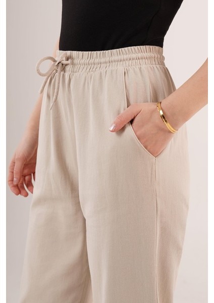 Cepli Belden Bağlamalı Paça Detaylı Krem Pantolon modelleri