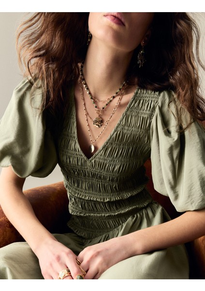 Dokulu V Yaka Kabarık Kollu Elbise