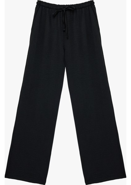 Rahat Kalıp Cep Detaylı Beli Bağcıklı Aerobin Kumaş Geniş Paça Pantolon modelleri