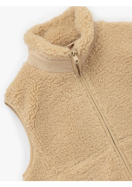 Dik Yaka Kolsuz Cepli Fermuarlı Peluş Crop Yelek indirimleri