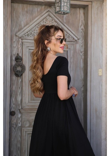 Eyesof Kadın Kısa Kollu Yuvarlak Yaka Önden Yırtmaçlı Cepli Viskon Uzun Elbise fiyatları