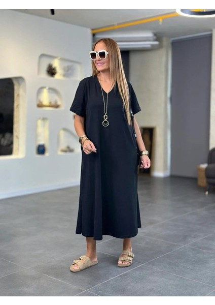 Eyesof Kadın Kısa Kollu V Yakalı Cep Detaylı Uzun Viskon Iki Iplik Elbise fiyatları