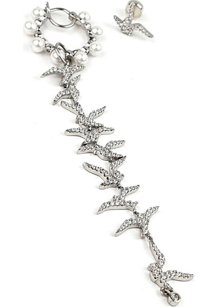 İtalyan tasarımı pırlanta ışıltısında zirkon taşlı gümüş efsane martılar asimetrik küpe kombin modelleri