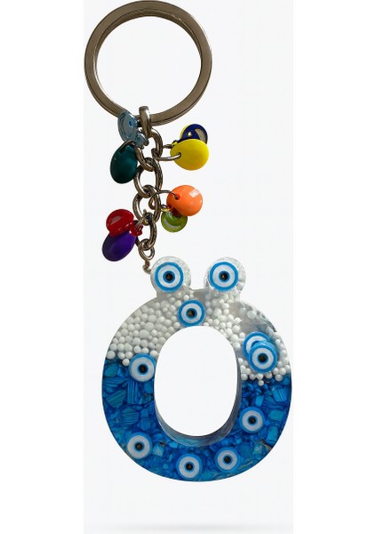 Epoksi Harf Anahtarlık – Ö Harfi, Nazar Boncuklu ve Renkli Charm Detaylı