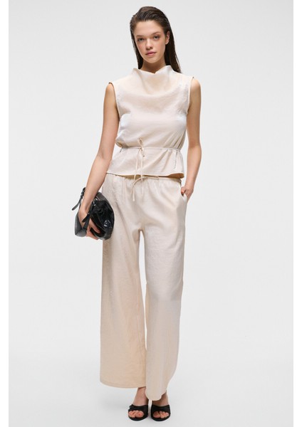 UBANITY Kadın Parlak Kumaşlı Geniş Paçalı Saten Görünümlü Ekru Pantolon