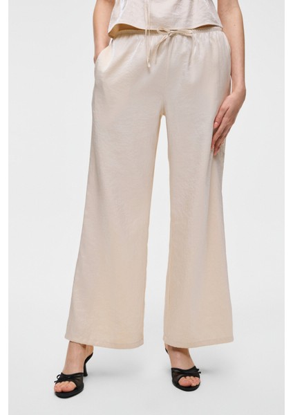 UBANITY Kadın Parlak Kumaşlı Geniş Paçalı Saten Görünümlü Ekru Pantolon indirimleri