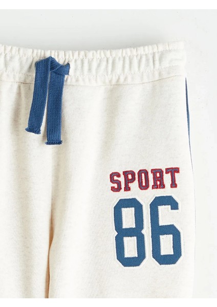 Kids Ekru Beli Lastikli Nakışlı Erkek Çocuk Jogger Eşofman Altı fırsatları