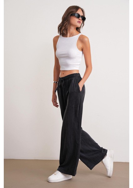 4697 Kadın Eskitme Bağcıklı Saten Bol Paça Palazzo Pantolon Siyah fırsatları