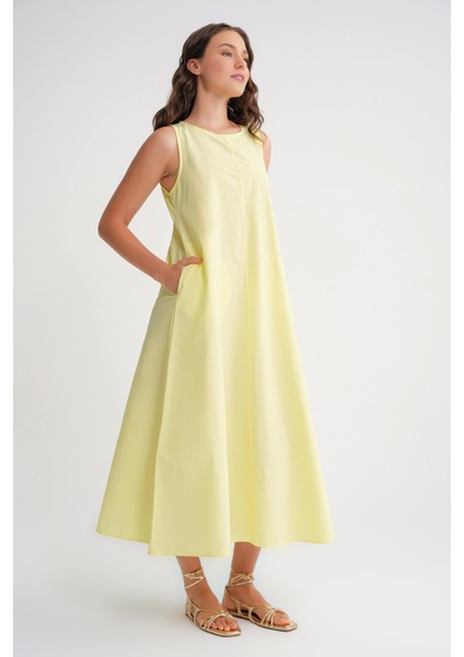 4690 Kadın Bisiklet Yaka Sıfır Kol Midi Paraşüt Elbise Sarı fırsatları