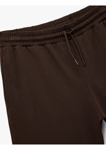 Beli Bağcıklı Cep Detaylı Pamuklu Straight Fit Spor Şort modelleri