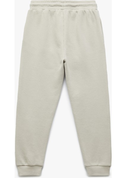 Pamuklu Beli Bağcıklı Dokulu Basic Jogger Eşofman Altı fiyatları