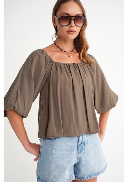 4706 Kadın Sırtı Açık Balon Kol Straplez Bluz Haki indirimleri