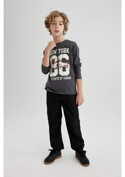 Erkek Çocuk Beli ve Paçası Lastikli Cepli Siyah Jogger Paraşüt Basic Düz Pantolon B6602A824SM