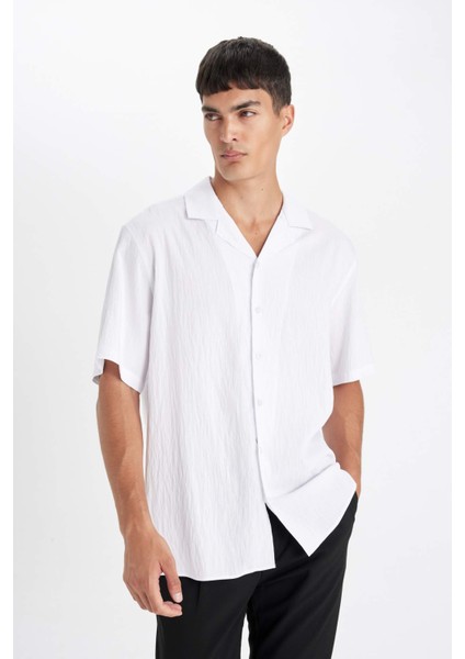 Beyaz Relax Fit Rahat Kesim Polo Yaka Krinkıl Kısa Kollu Gömlek C4127AX24AU