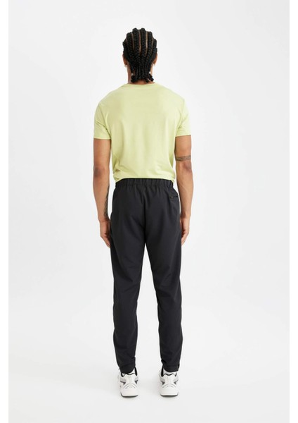Sporcu Jogger Eşofman Altı Slim Fit Dar Kesim Dokuma Üç Cepli Fermuarlı Paça B2780AX24SM