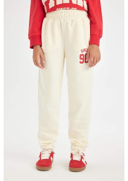 Kız Çocuk Ekru Baskılı Beli Paçası Lastikli Cepli Jogger Okul Eşofman Altı