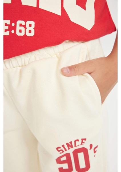 Kız Çocuk Ekru Baskılı Beli Paçası Lastikli Cepli Jogger Okul Eşofman Altı