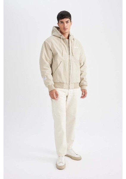 Su İtici Oversize Fit Geniş Kalıp Nakış Detaylı İç Cepli Kapüşonlu Ribanalı Fermuarlı Cepli Mont C6338AX24AU