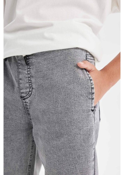 Erkek Çocuk Beli Bağcıklı Cepli Lastikli Paça Jogger Jean Pantolon C4601A824AU