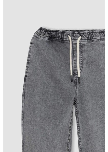 Erkek Çocuk Beli Bağcıklı Cepli Lastikli Paça Jogger Jean Pantolon C4601A824AU