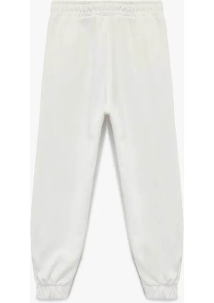 Şardonlu Beli Lastikli Baskılı Jogger Ekru Kız Çocuk Eşofman Altı 6WKG40049AK fiyatları