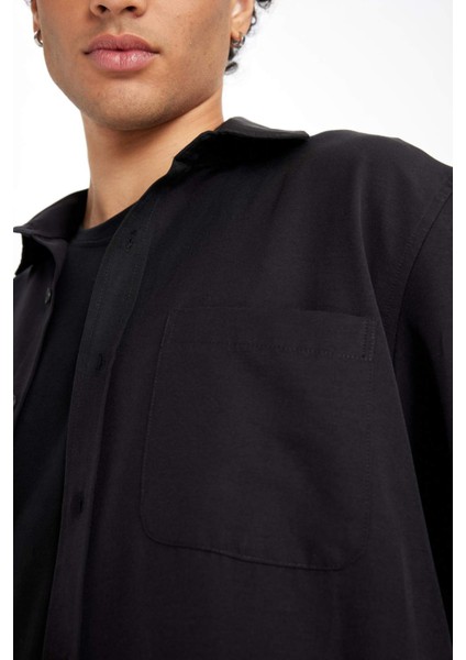 Regular Fit Düğmeli Yaka Basic Düz Pamuk Karışımlı Uzun Kollu Siyah Gömlek D4183AX24AU