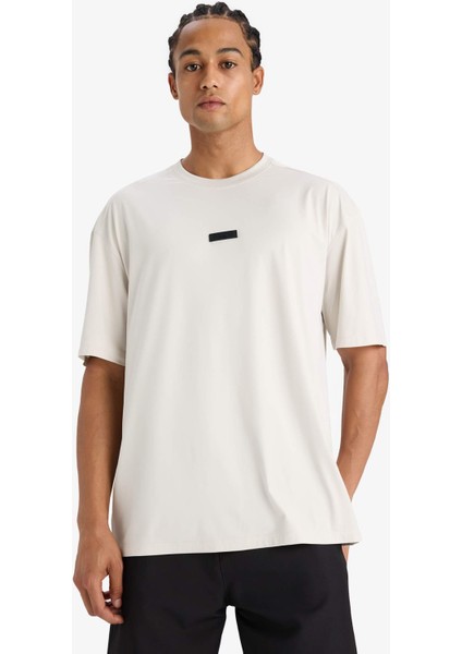 DeFactoFit Boxy Fit Bisiklet Yaka Baskılı Sporcu Kısa Kollu Tişört D7365AX25SP