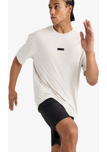 DeFactoFit Boxy Fit Bisiklet Yaka Baskılı Sporcu Kısa Kollu Tişört D7365AX25SP