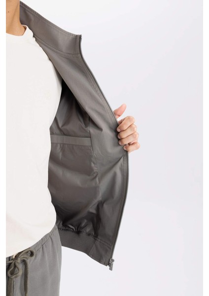 Slim Fit Dar Kesim Dik Yaka Astarlı Fermuarlı Cepli Mevsimlik Baharlık Mont D7338AX25SP