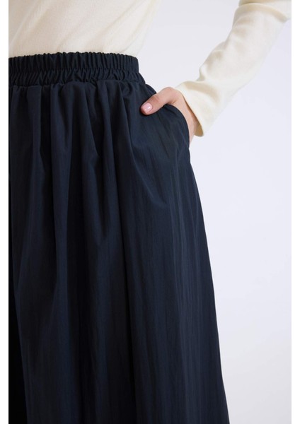 A Kesim Esnek Belli Paraşüt Kumaş Maxi Tesettür Etek