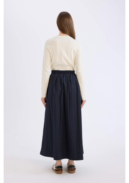 A Kesim Esnek Belli Paraşüt Kumaş Maxi Tesettür Etek