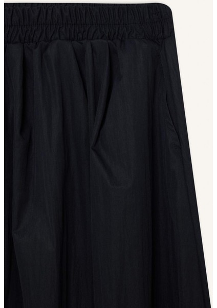 A Kesim Esnek Belli Paraşüt Kumaş Maxi Tesettür Etek