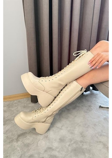 Kadın Bej Cilt Bağcık Detaylı Fermuarlı 9 cm Topuklu Platfomlu Çizme modelleri