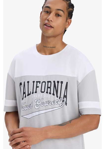 Fit Hızlı Kuruyan Oversize Geniş Kalıp Bisiklet Yaka Baskılı Sporcu Kısa Kollu Tişört E4122AX25SM