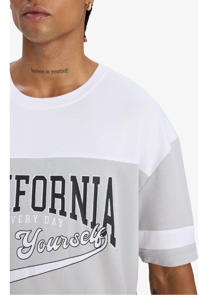 Fit Hızlı Kuruyan Oversize Geniş Kalıp Bisiklet Yaka Baskılı Sporcu Kısa Kollu Tişört E4122AX25SM