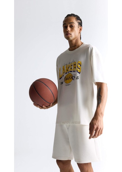 %100 Pamuk DeFactoFit NBA Los Angeles Lakers Oversize Geniş Kalıp Bisiklet Yaka Kısa Kollu Tişört E5871AX25AU
