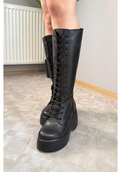 Kadın Siyah Cilt Bağcık Detaylı Fermuarlı 9 cm Topuklu Platfomlu Çizme fiyatları