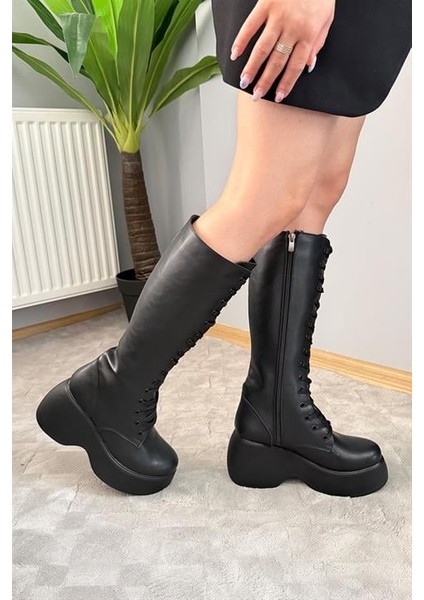 Kadın Siyah Cilt Bağcık Detaylı Fermuarlı 9 cm Topuklu Platfomlu Çizme modelleri
