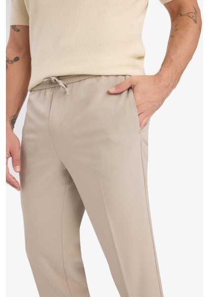 Beli Bağcıklı Lastikli Cepli Jogger Fit Her Yöne Esneyen Yumuşak Tuşe Pantolon A9943AX25AU
