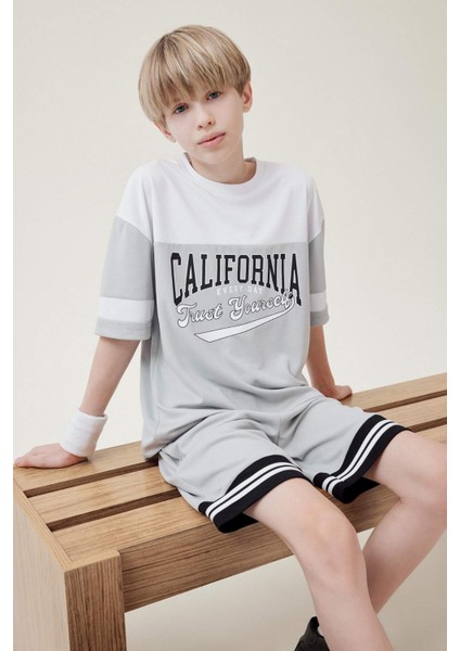 Erkek Çocuk Oversize Geniş Kalıp Bisiklet Yaka Renk Bloklu Baskılı Kısa Kollu Tişört F2415A825HS