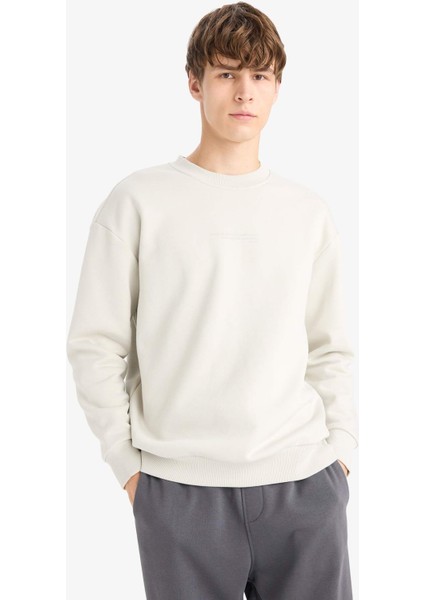 Boxy Fit Bisiklet Yaka İçi Yumuşak Tüylü Baskılı Sweatshirt X8282AZ25AU