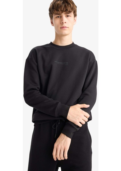 Boxy Fit Bisiklet Yaka İçi Yumuşak Tüylü Baskılı Sweatshirt X8282AZ25AU