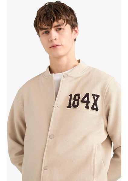 Regular Fit Bomber Kolej Yaka Nakış Detaylı İç Cepli Çıtçıtlı Mont F5096AX25AU
