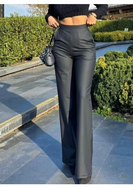 Kadın Yüksek Bel Cepli Şardonlu Geniş Paçalı Mat Deri Pantolon